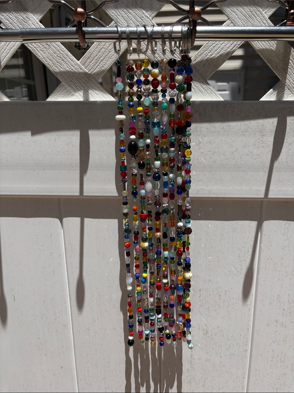 Ten strands measuring 18 inches long made with glass & crystal beads